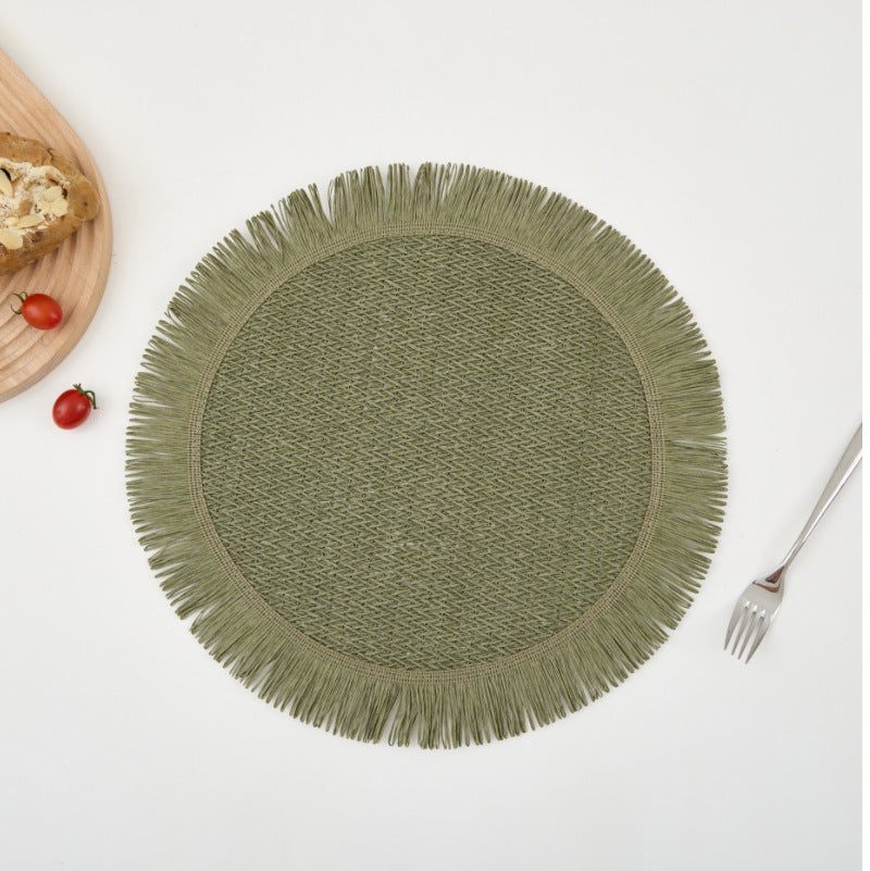 Set de table rond vert en papier tissé avec franges, lot de 4, design naturel et élégant pour protection de table.