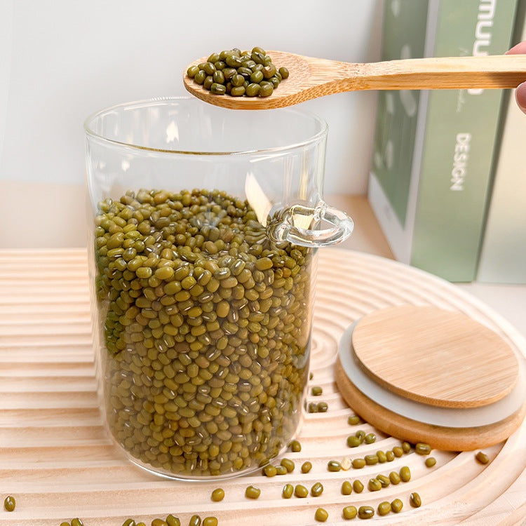Bocaux en verre avec cuillère en bois pour conserver aliments secs avec style naturel
