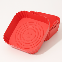 Moule en silicone rouge anti-adhésif pour airfryer, réutilisable et facile à nettoyer, idéal pour cuisiner légumes, frites et gâteaux.