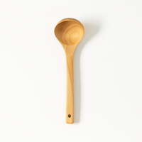 Spatule en bois naturel douce au toucher, design élégant et durable pour cuisine</s>