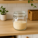Bocal en verre avec couvercle articulé hermétique pour stockage aliments secs, design simple et fonctionnel.