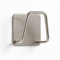 Minimalist metallic sponge holder with wall mount, brushed stainless steel finish, designed for easy installation without drilling.