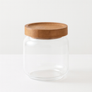 Bocal en verre transparent avec couvercle en bois élégant pour rangement cuisine design.