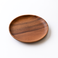 Plateau de service rond en bois avec grain naturel et finition lisse