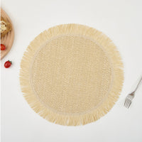 Set de 4 sets de table ronds en papier tissé naturel, élégants et protecteurs pour repas conviviaux.