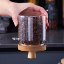 pots en verre transparent avec cuillère en bois, stockage de café, design fonctionnel et naturel pour cuisine organisée