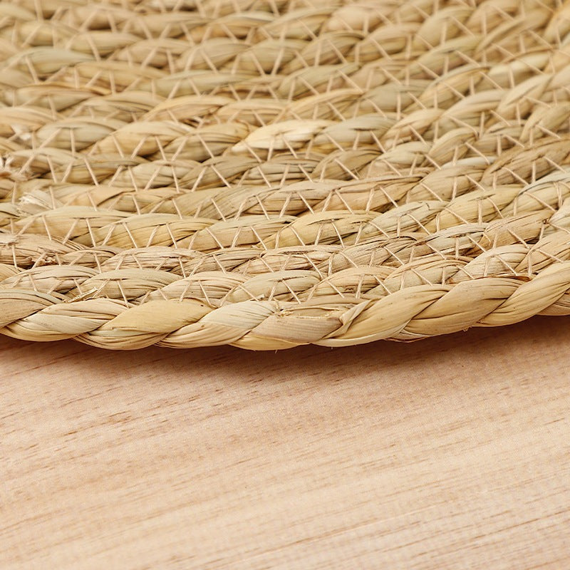 Set de table rond en rotin tressé à la main, naturel et écologique, protège la table avec élégance.