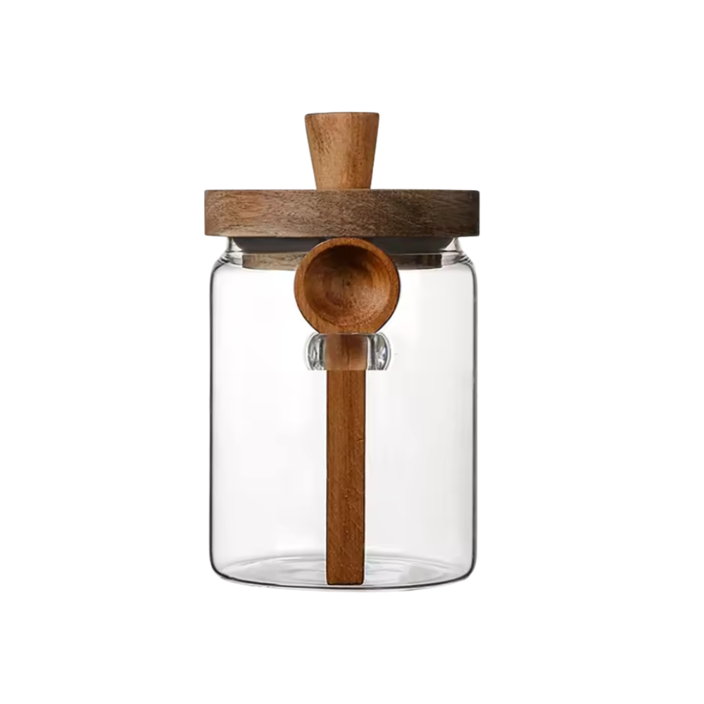 Pots en verre avec cuillères en bois