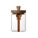 Pots en verre avec cuillères en bois